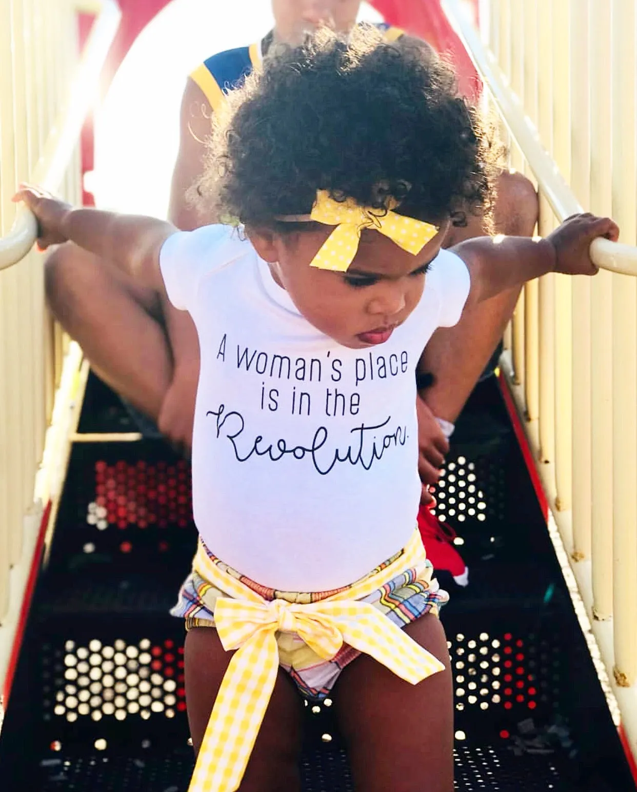 A Woman's Place Is In The Revolution Organic Baby Onesie®