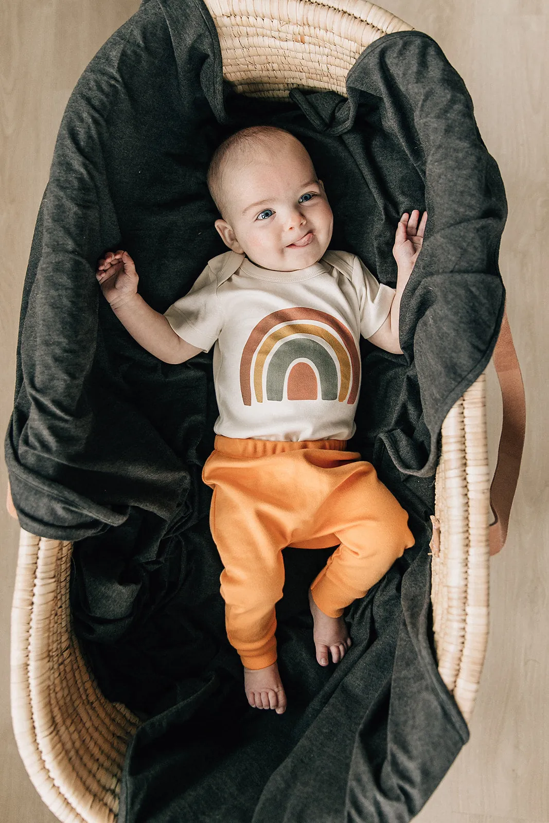 Dark Rainbow Organic Baby Onesie®